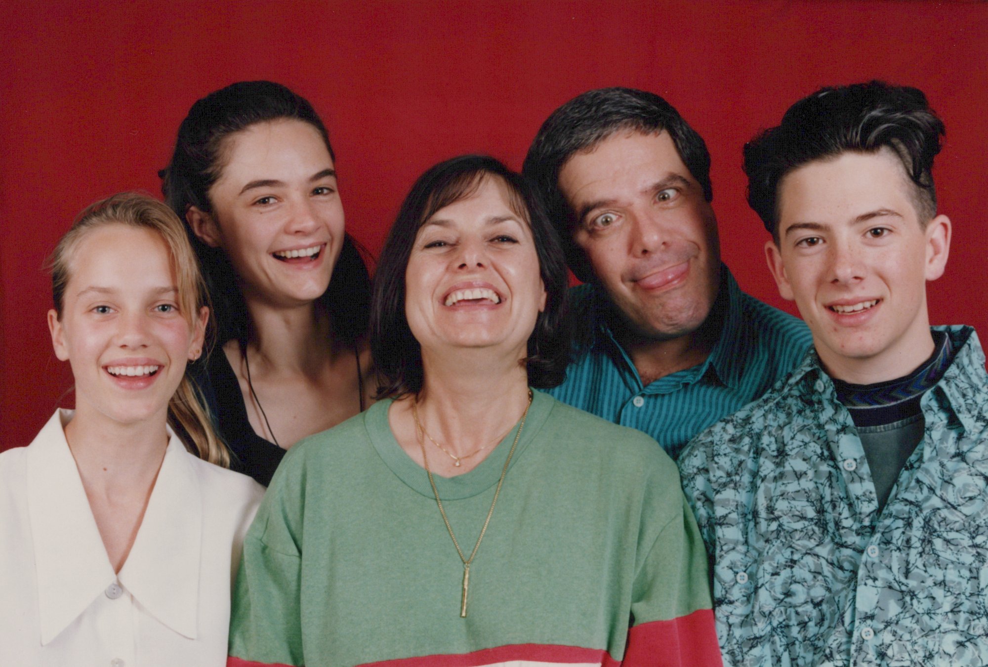 The Townsend family portrait, 1990s, everyone laughing, Simon pulling a face